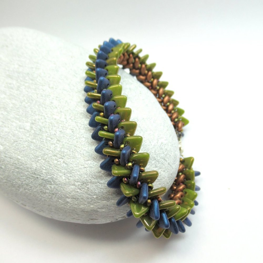 Handwoven blue green and copper bracelet